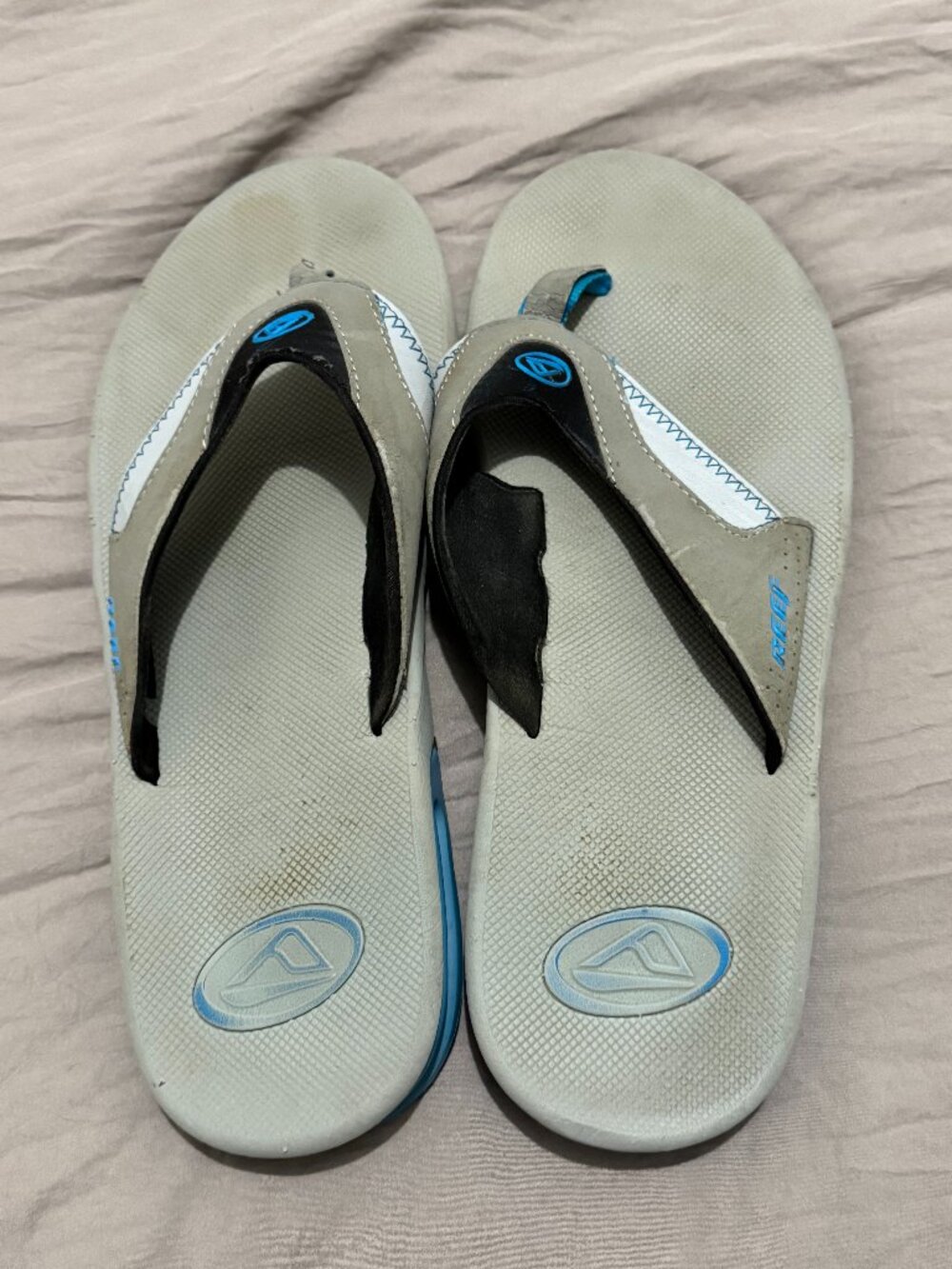 RETAIL $90 Reef Fanning flip flops with bottle opener